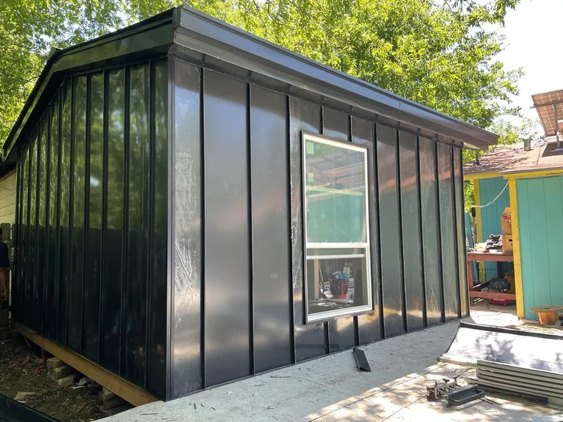 Black standing seam metal wall panels for Metal Roof Installation in Tracy